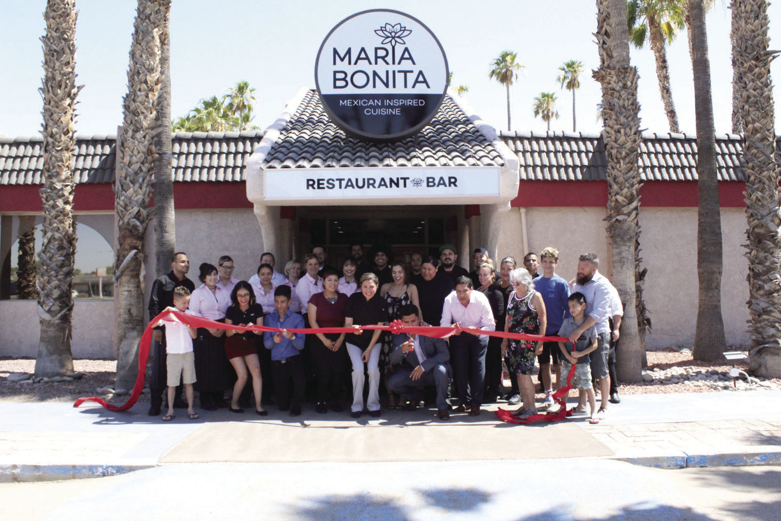 Photo: Maria Bonita ribbon cutting